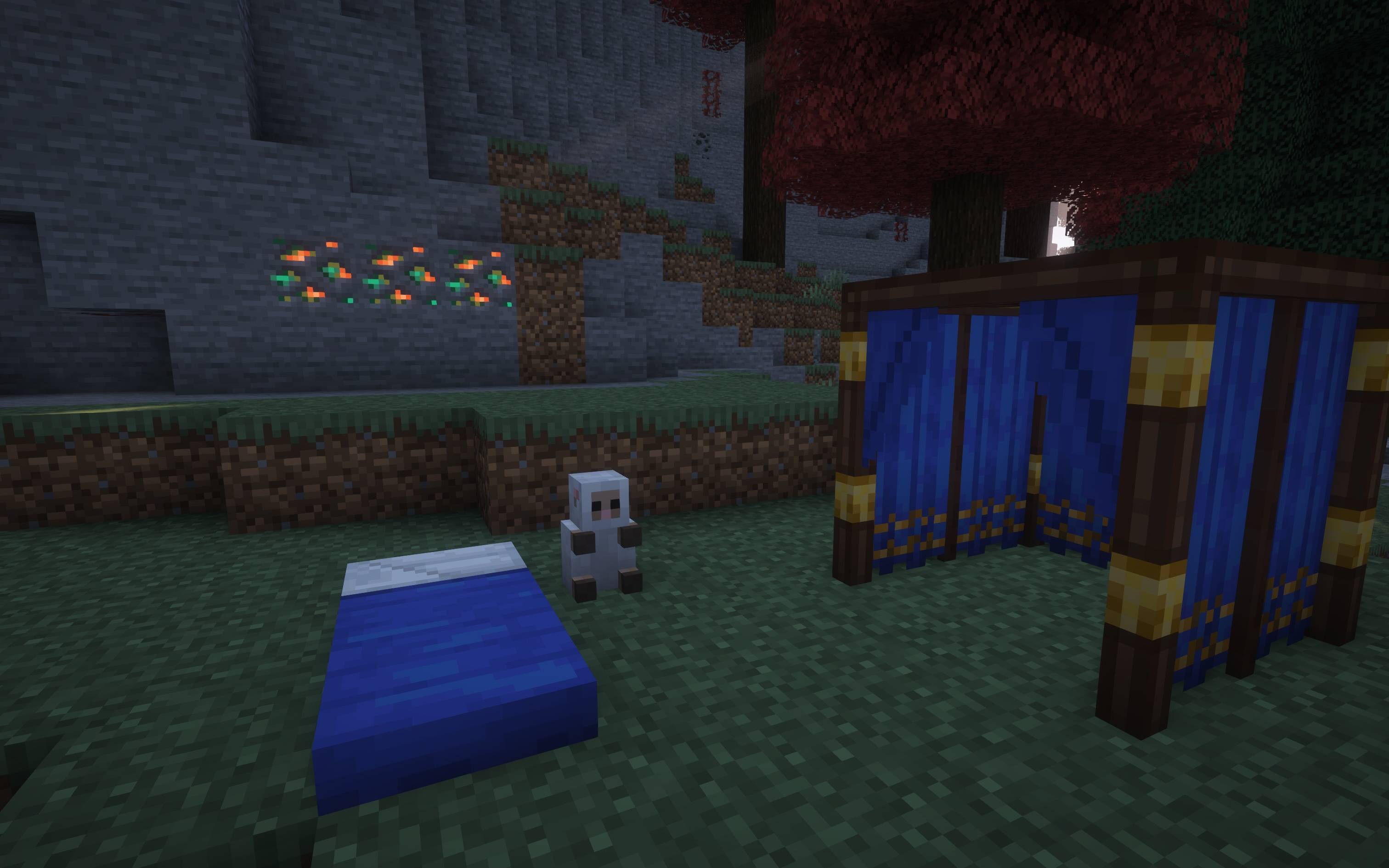 Синяя спальная сумка, овечья сумка и палатка Синяя спальная сумка, овечья сумка и палатка