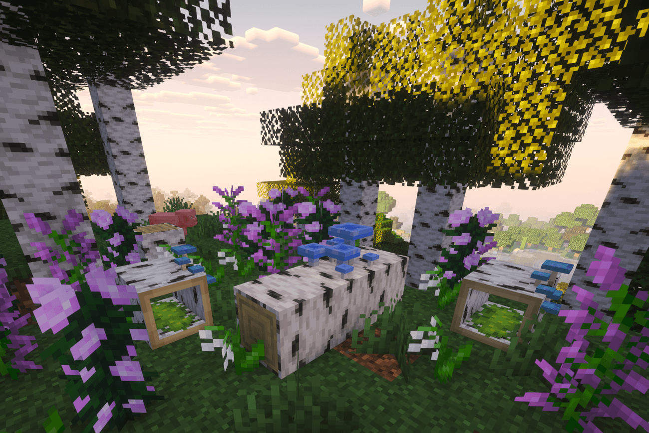 Несколько поваленных берёзовых бревен, окружённые яркой флорой. Несколько поваленных берёзовых бревен, окружённые яркой флорой.